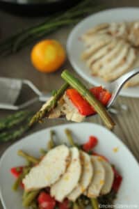 Fiery Lemon-Garlic Chicken with asparagus, green beans and Peppers | KitchenCents.com