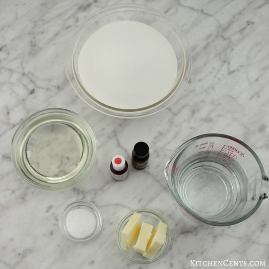 Ingredients to make salt water taffy including butter, water, corn syrup, salt, sugar, flavoring and coloring.