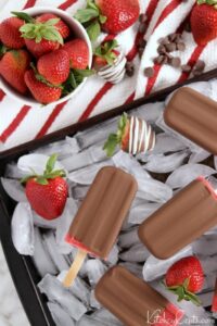 Easy 3-Ingredient Chocolate Covered Strawberry Popsicles | Kitchen Cents