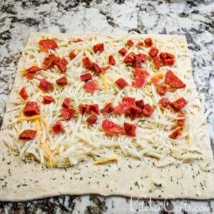 Layer ingredients on puff pastry | Kitchen Cents