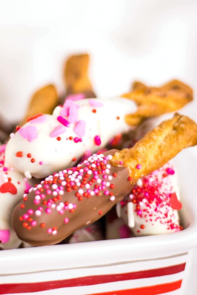Valentine's inspired Caramel Chocolate dipped pretzel rods