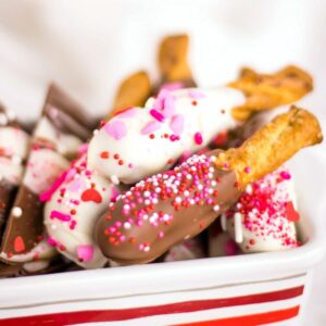 Thumbnail for caramel chocolate dipped pretzel rods | Kitchen Cents