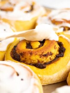 Frosting pumpkin chocolate chip roll