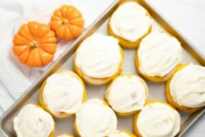 top down photo of cream cheese frosted rolls for fall