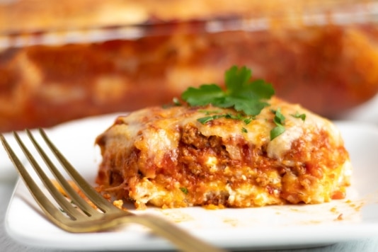 Layers of lasagna filled with cheese and meat