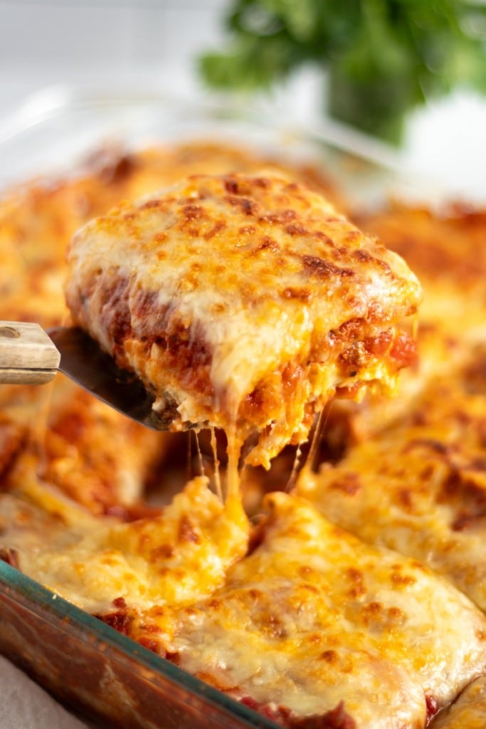 A slice of easy lasagna that has fresh egg roll wrappers instead of fresh pasta.