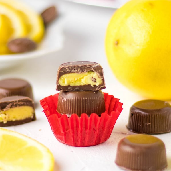 Lemon filled chocolate cut in half to show interior.