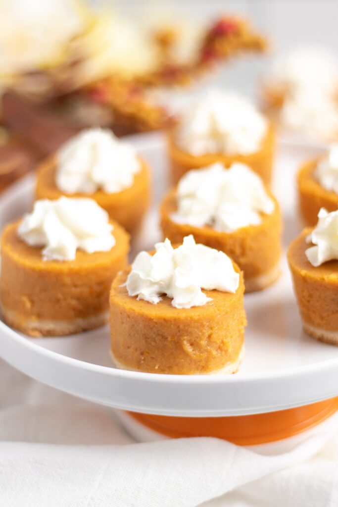 A plate of bite size pies for thanksgiving table.